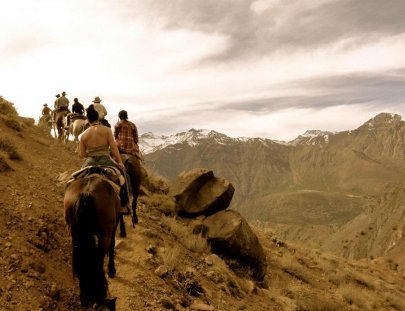 Cascada De Las Animas-Horseback riding at the Andes Mountains in Chile  