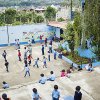 Niños De Guatemala-Visit a chicken bus refurbishing shop, carpenter 's workshop, and an educational project