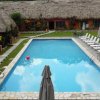 Tikal Inn -Disfruta la tranquilidad de un paraíso en medio de la Selva