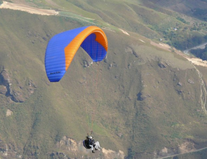 Gravity Tours-Tandem paragliding through the Mountains of Gonzales` Valley 
