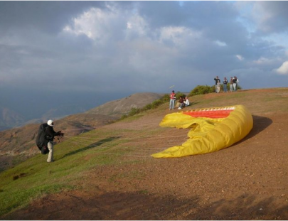 Gravity Tours-Tandem paragliding through the Mountains of Gonzales` Valley 