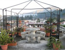 Stay at a hotel with a direct view to the Agua volcano just around the corner of a colonial church - Hotel Posada La Merced